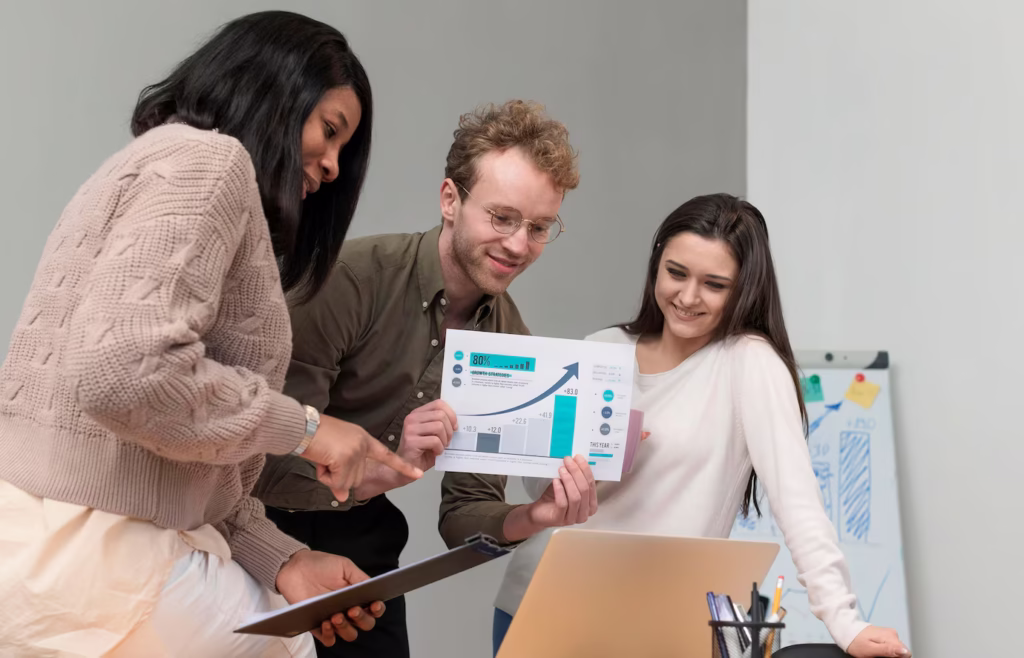 Startup team brainstorming digital marketing strategy to boost online presence